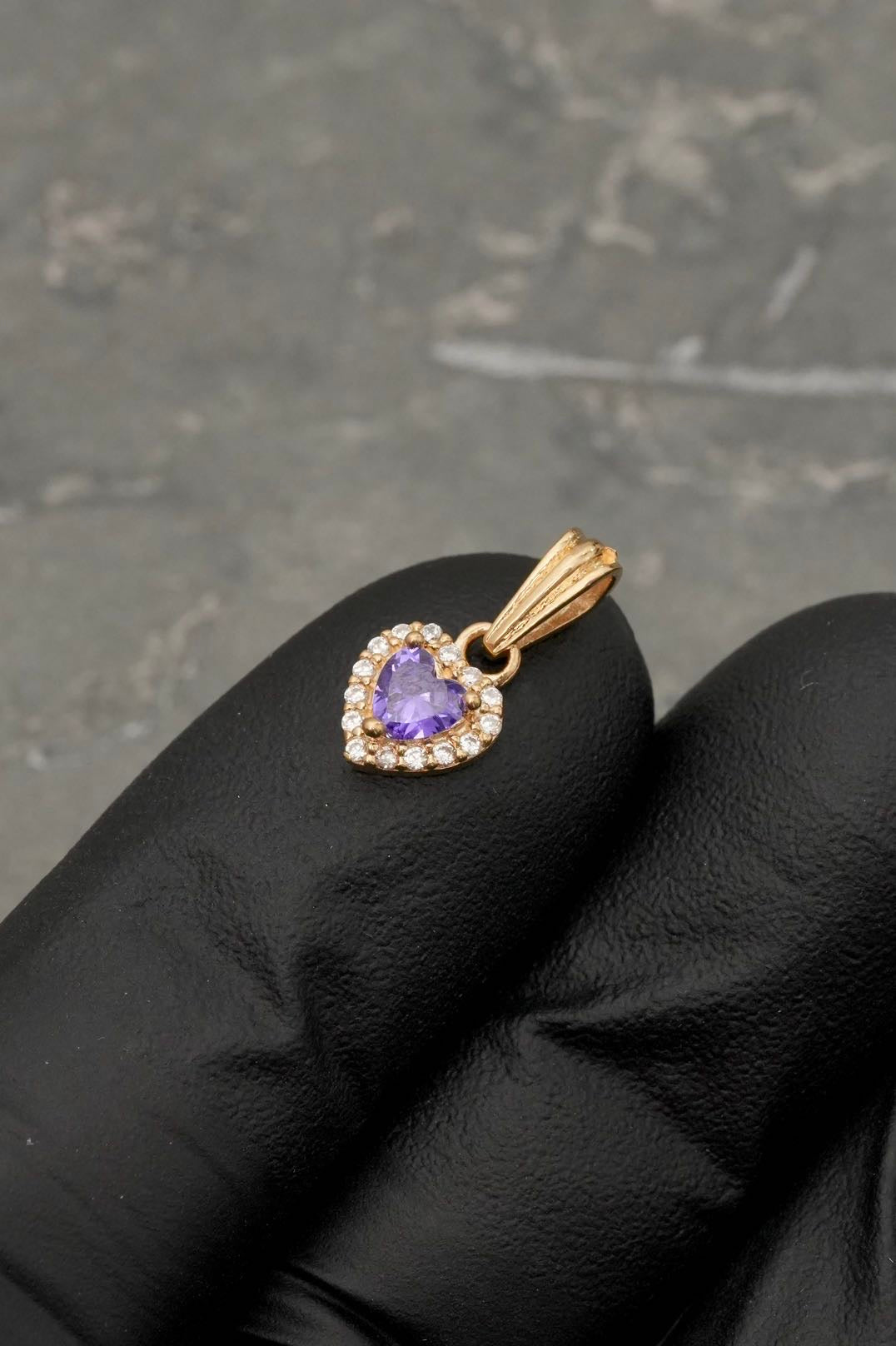 Dije corazon con swarovski morado y blanco 0.9gr / Largo 1.4cm / Oro Amarillo Nac B