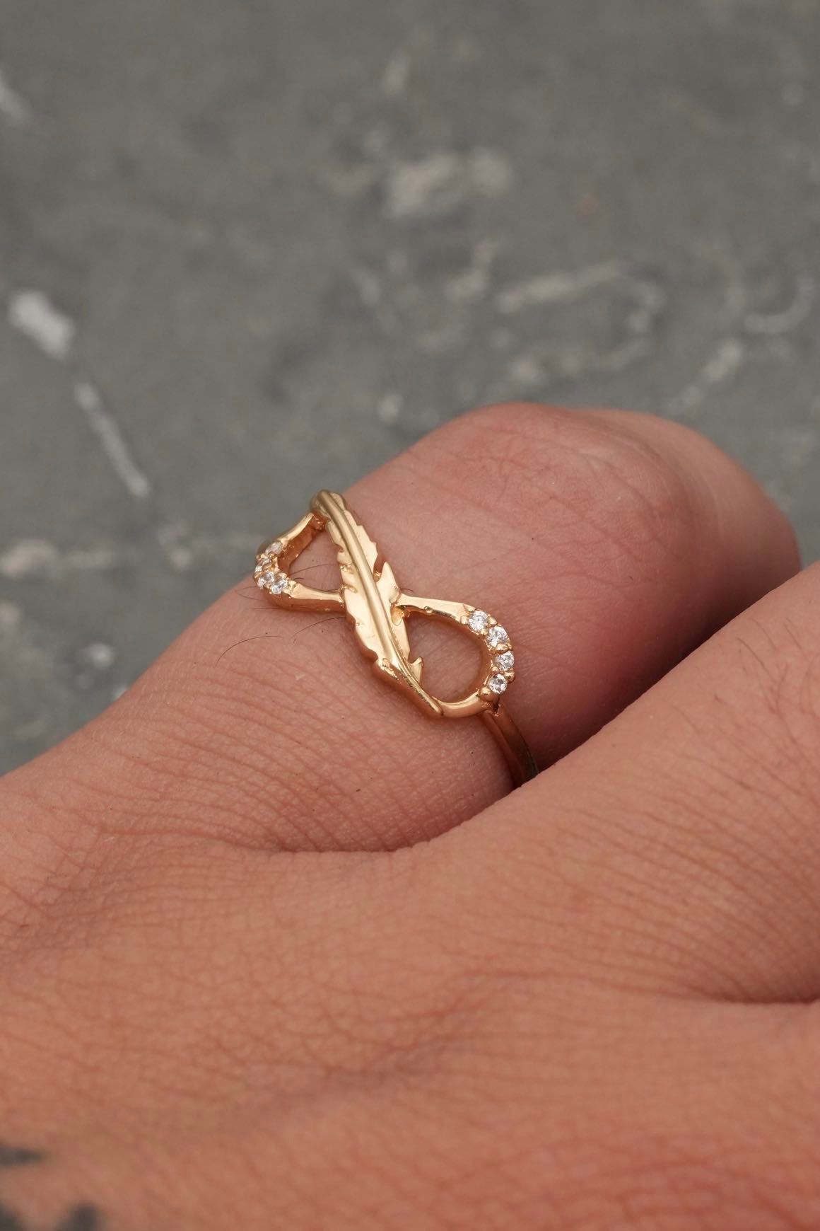 Anillo infinito con swarovski blanco 1.5gr / TALLA 6 1/4 / Oro Amarillo Nac M