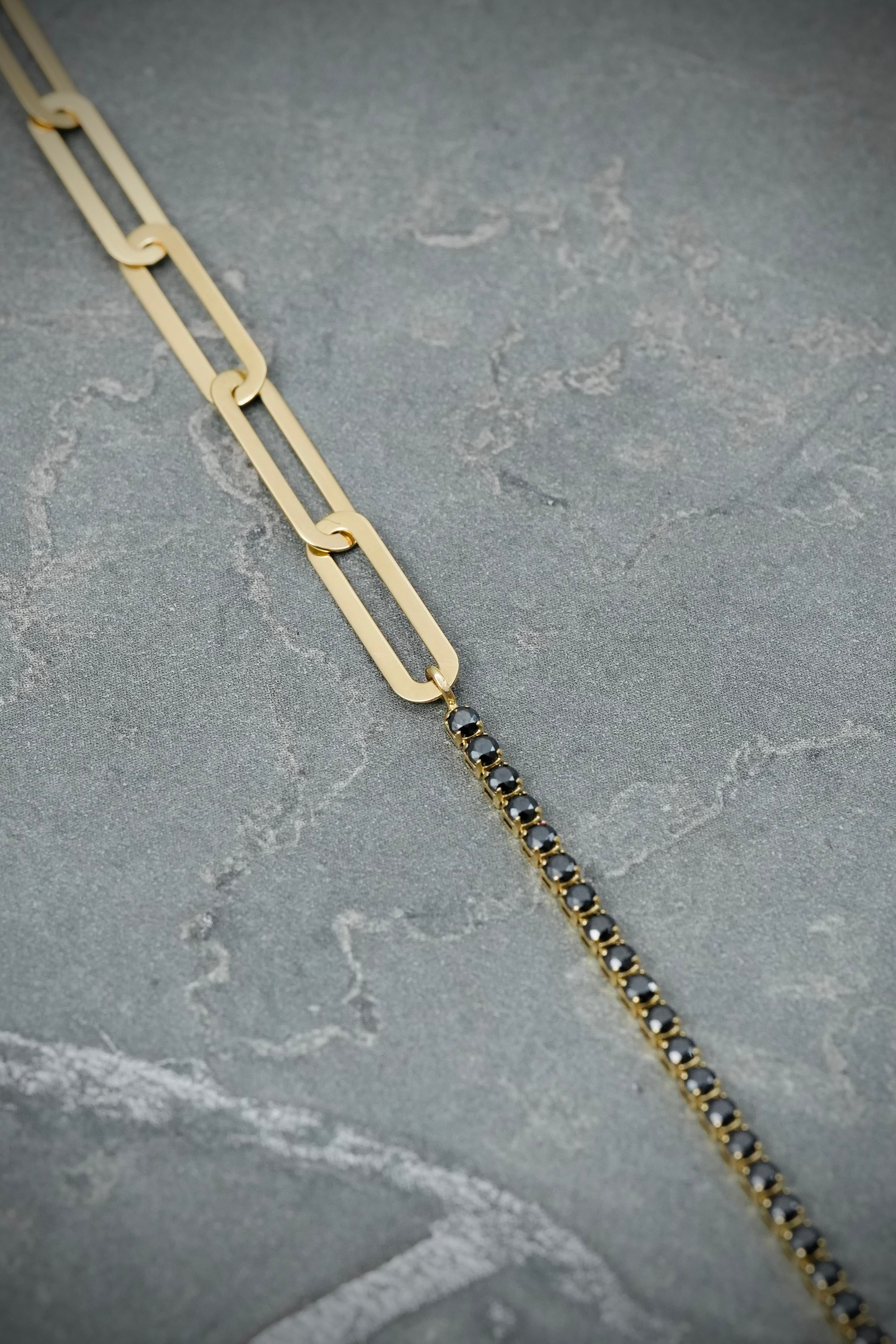 Pulso tenis con swarovski negro 2.6gr / Largo 18.5cm / Oro Amarillo italy +4 M