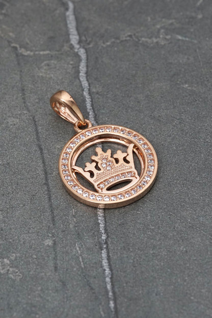 Dije corona con swarovski blanco 5.3gr / Largo 3.1cm — Oro Rosado
