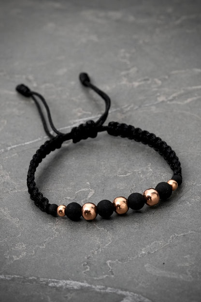 Pulsera en hilo negro bolas lisas. 0.75gr / Oro Rosado (Joya) M