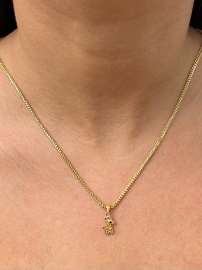 Dije jirafa con swarovski amarillo 1gr / Largo 1.9cm / Oro Amarillo Nac B