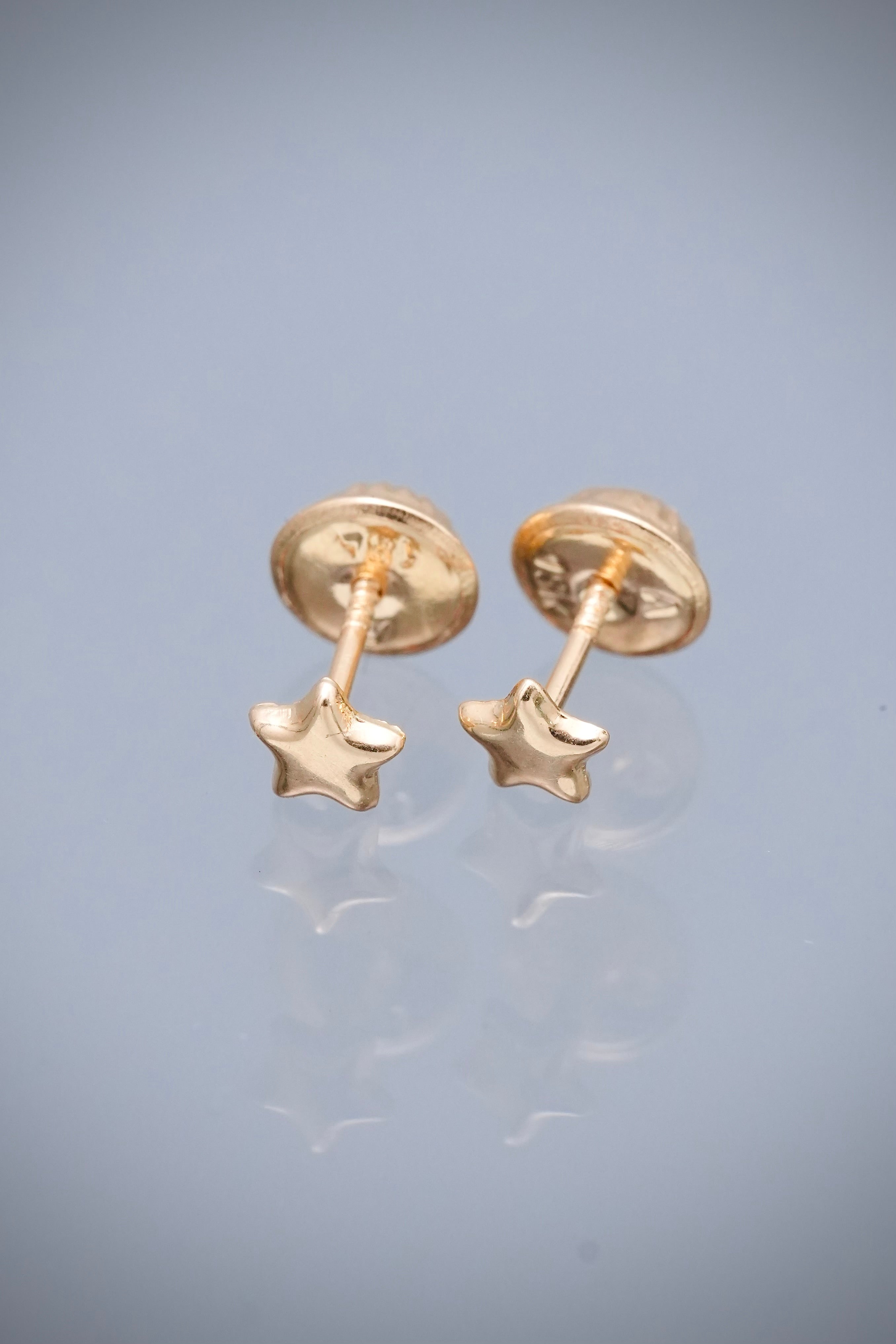 Topos estrella 0.4gr / Largo 0.4cm — Oro Amarillo
