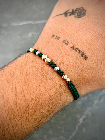 Pulsera en hilo verde con bolas diamantadas 0.75gr — Dos Oros