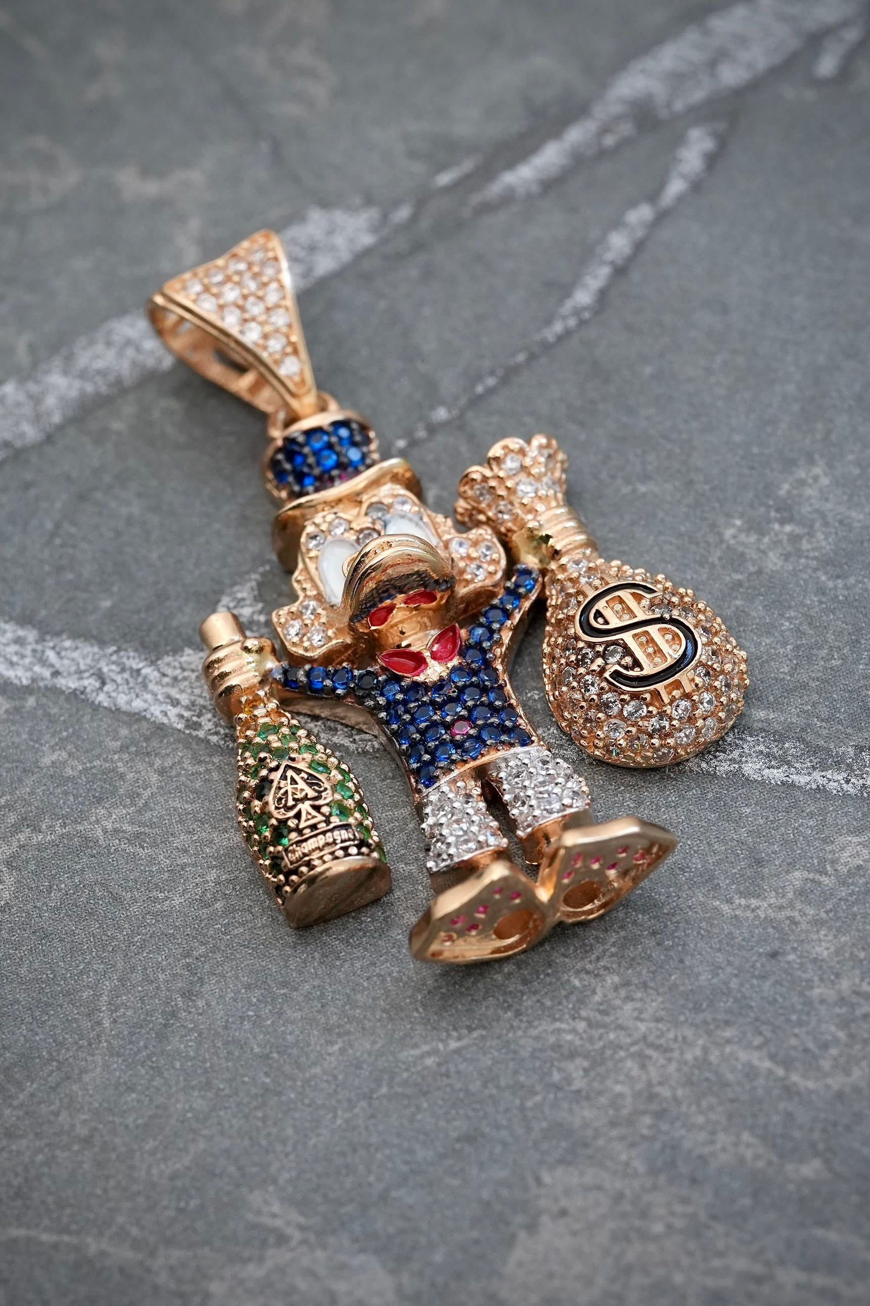 Dije tio rico con swarovski multicolor 8.5gr / Largo 4cm / Oro Amarillo Nac M