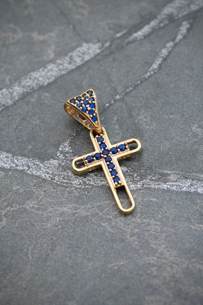 Dije cruz con swarovski azul 1.15gr / Largo 2.3cm / Oro Amarillo Nac M