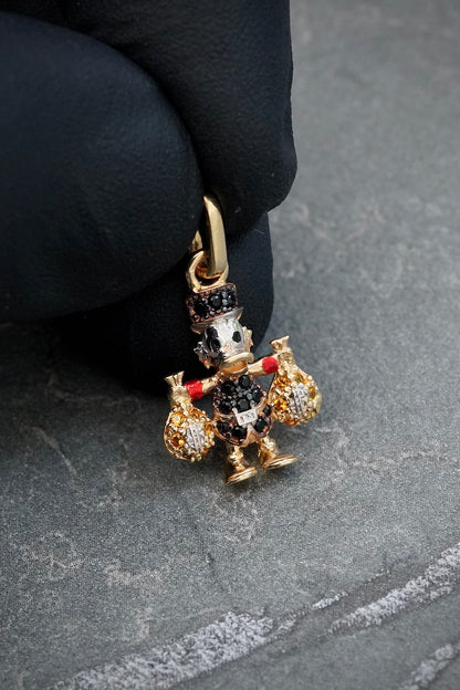 Dije tio rico con swarovski negro y amarillo 1.5gr / Largo 2.1cm — Oro Amarillo