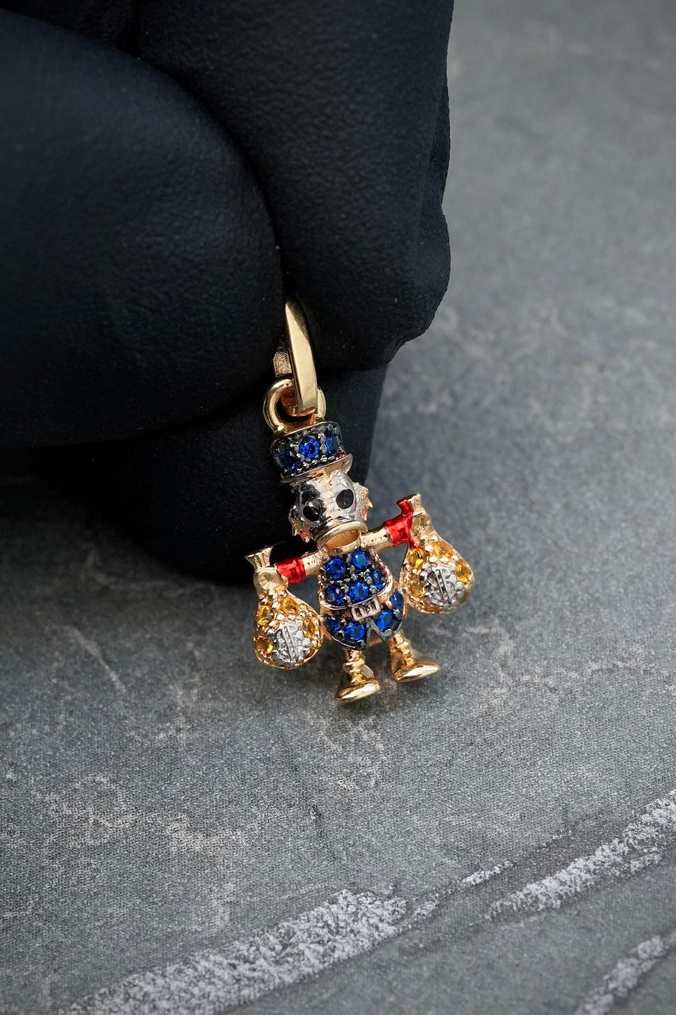 Dije tio rico con swarovski azul y amarillo 1.4gr / Largo 2.1cm — Oro Amarillo