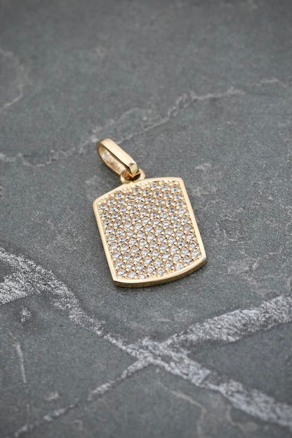 Dije placa con swarovski blanco 1.95gr / Largo 2.2cm / Oro Amarillo Nac M