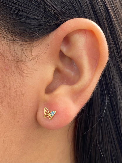 Topos mariposa con swarovski azul 0.7gr / Largo 0.5cm — Oro Amarillo