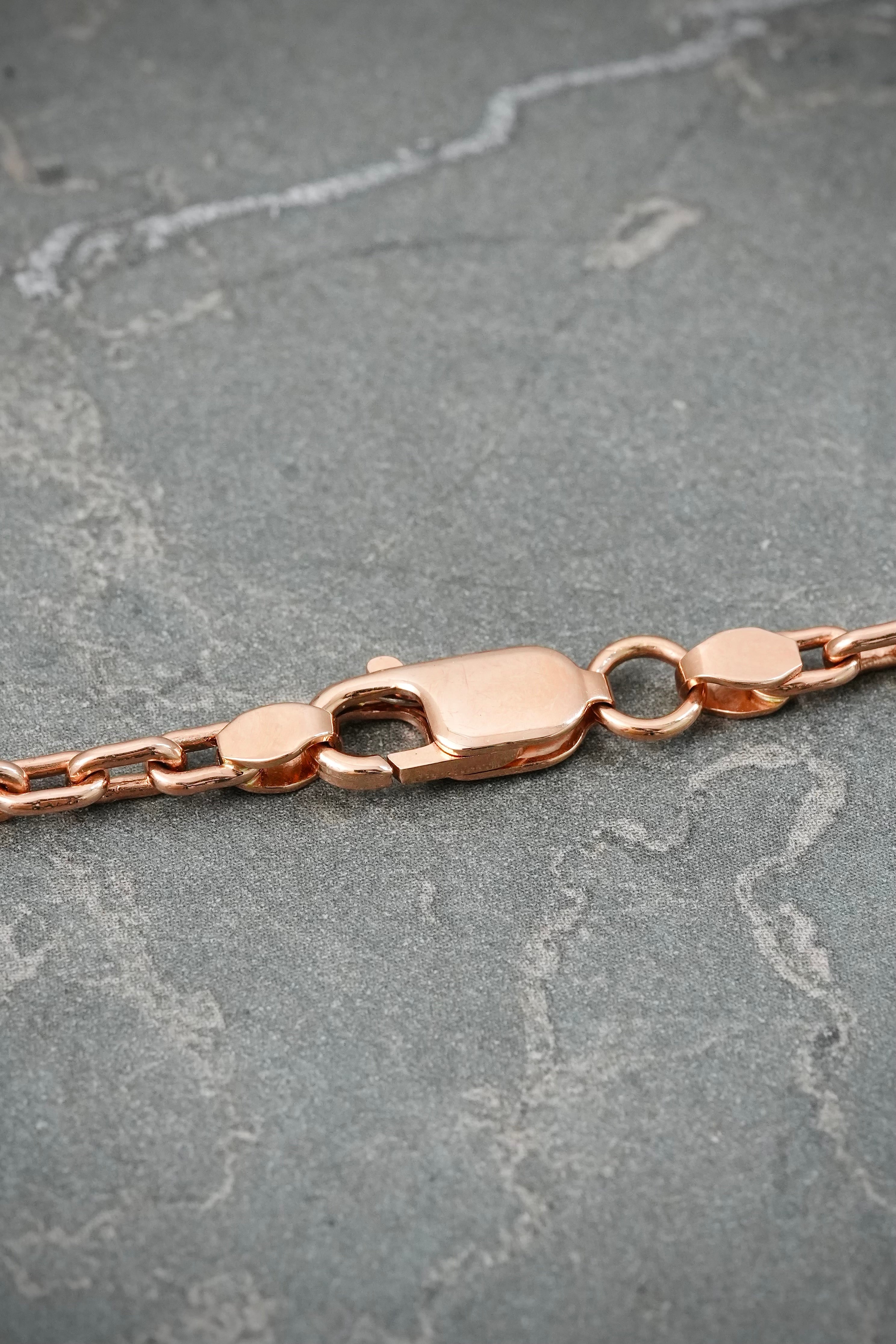 Cadena lucky clover piedra negra y diamantada 29.9gr / Largo 50cm / Oro Rosado Nac M