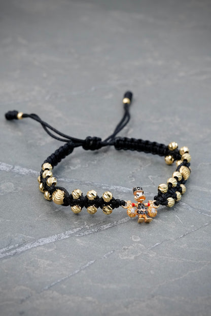 Pulsera en Hilo Negro con Herraje Tio Rico y Bolas Diamantadas 4.45gr — Oro Amarillo