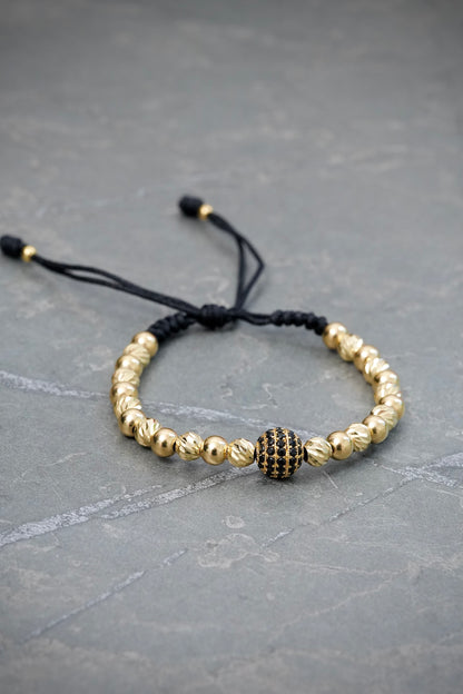 Pulsera en Hilo Negro con Bolas Lisas y Diamantadas 5.4gr — Oro Amarillo