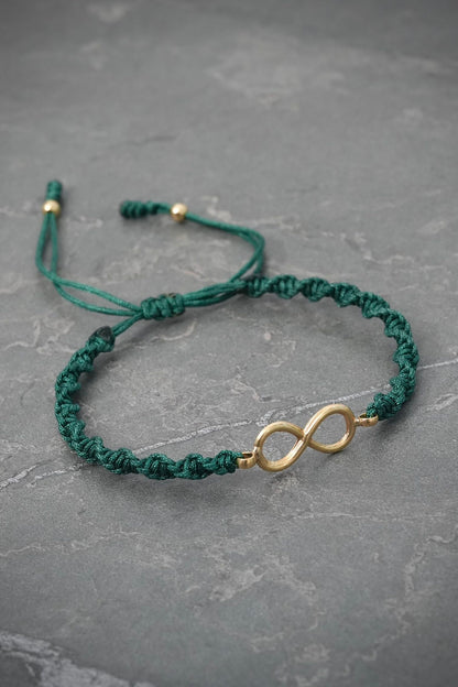 Pulsera en hilo verde con herraje infinito 0.5gr / Oro Amarillo (Joya) M