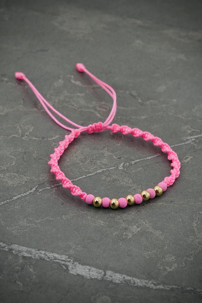 Pulsera en Hilo Rosado con bolas lisas y neoprenos 0.4gr — Oro Amarillo