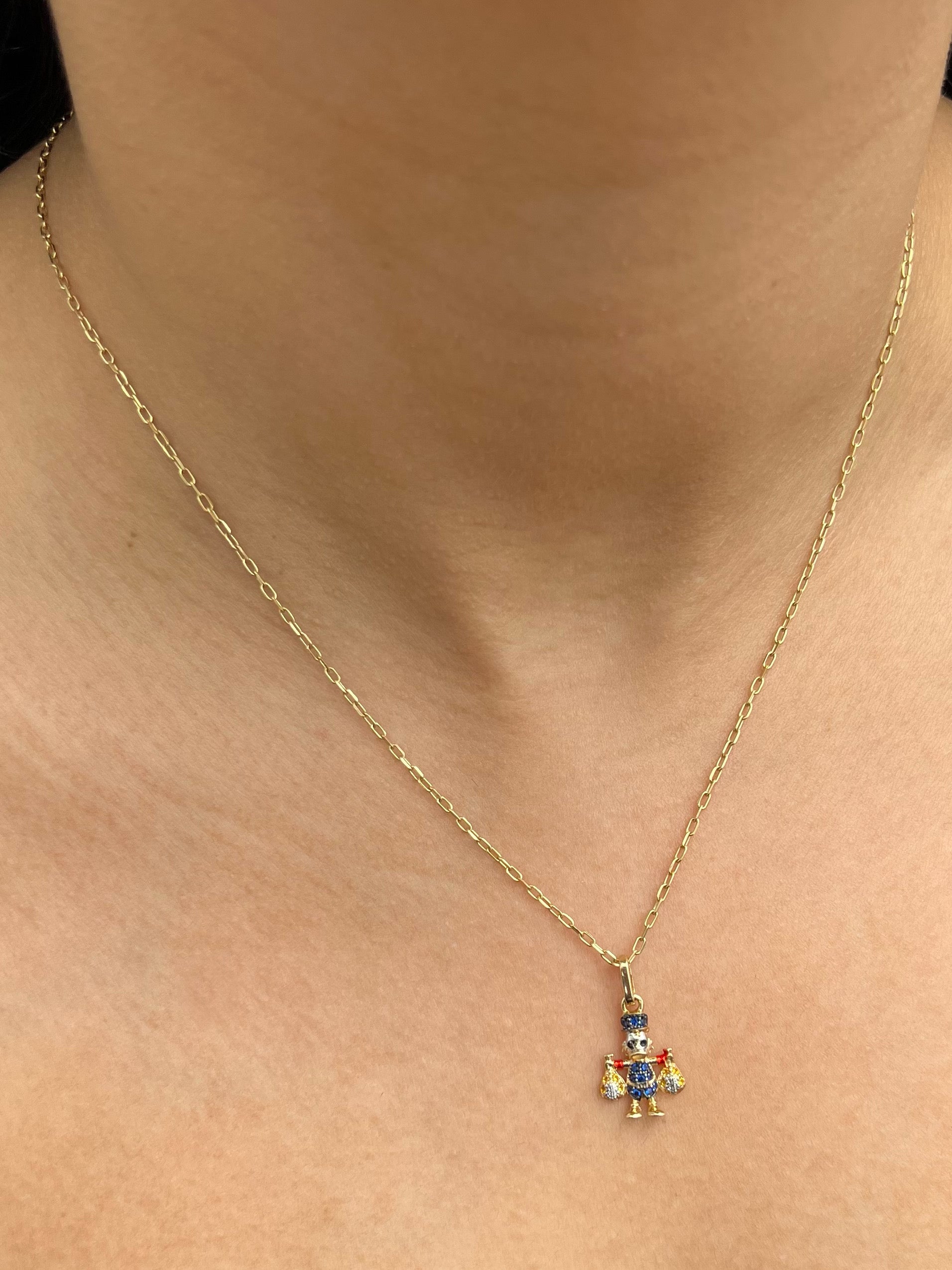 Dije tio rico con swarovski azul y amarillo 1.4gr / Largo 2.1cm — Oro Amarillo