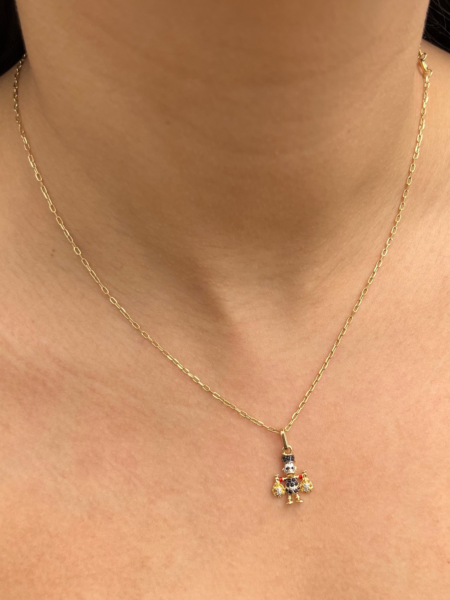 Dije tio rico con swarovski negro y amarillo 1.5gr / Largo 2.1cm — Oro Amarillo