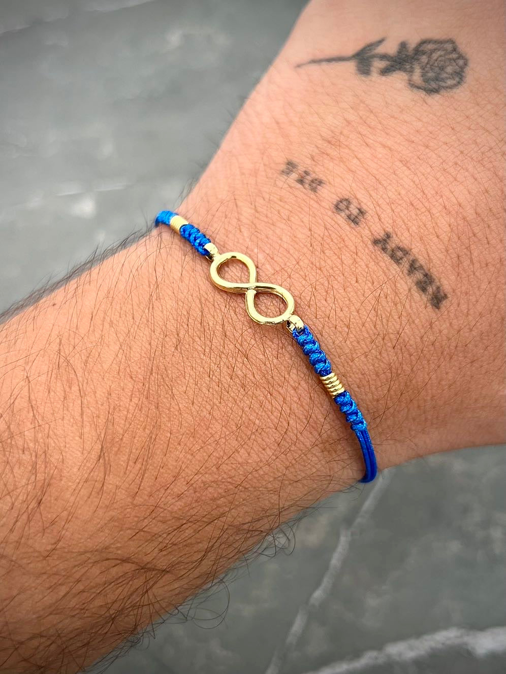 Pulsera en hilo azul con herraje infinito 1gr / Oro Amarillo (Joya) M