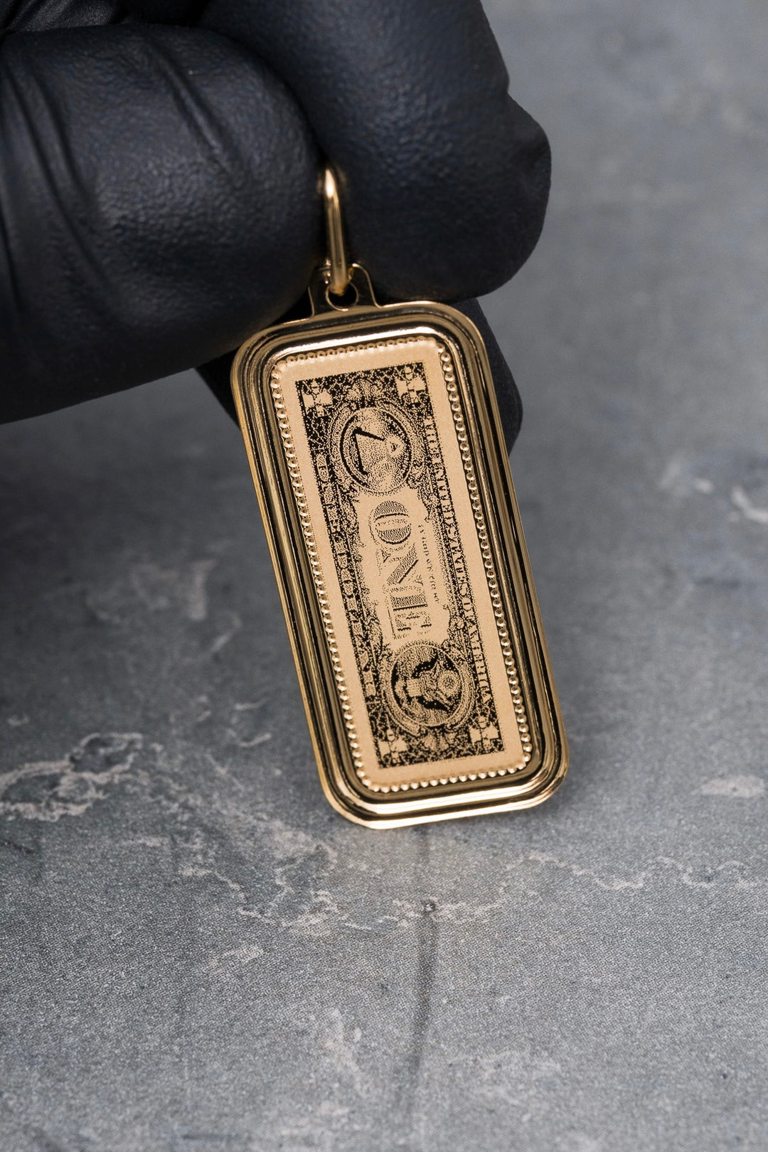 Dije dolar 2.25gr / Largo 4.1cm — Oro Amarillo