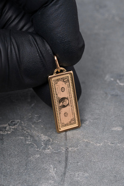 Dije dolar 1.05gr / Largo 2.9cm / Oro Rosado italy +4 M