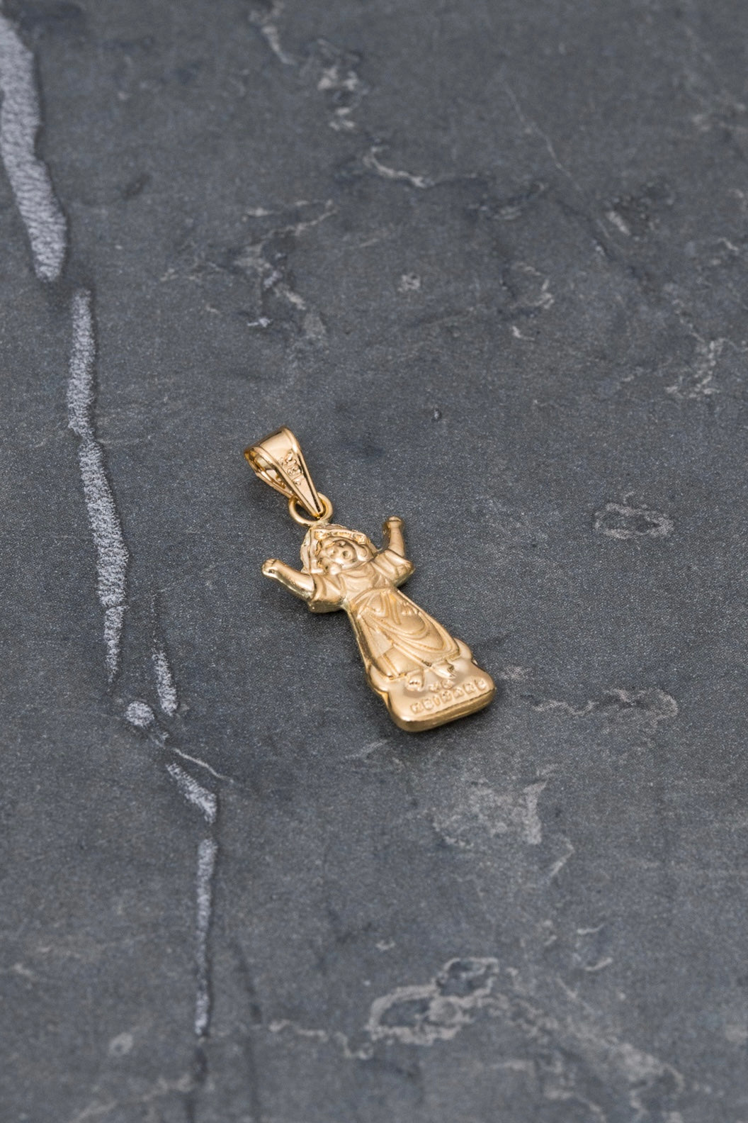 Dije divino niño 0.55gr / Largo 2.2cm — Oro Amarillo