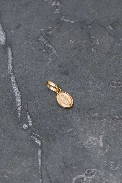 Dije virgen de la milagrosa 0.3gr / Largo 1.4cm / Oro Amarillo Nac B