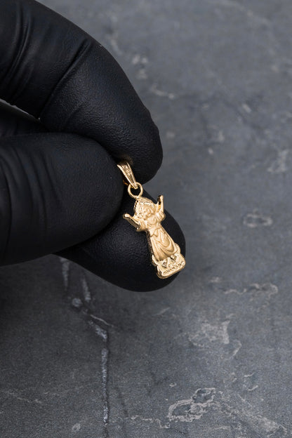 Dije divino niño 0.55gr / Largo 2.3cm — Oro Amarillo