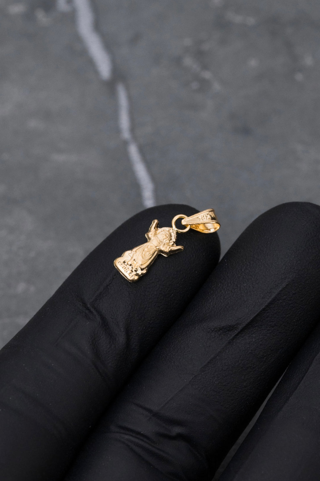 Dije divino niño 0.35gr / Largo 1.8cm — Oro Amarillo