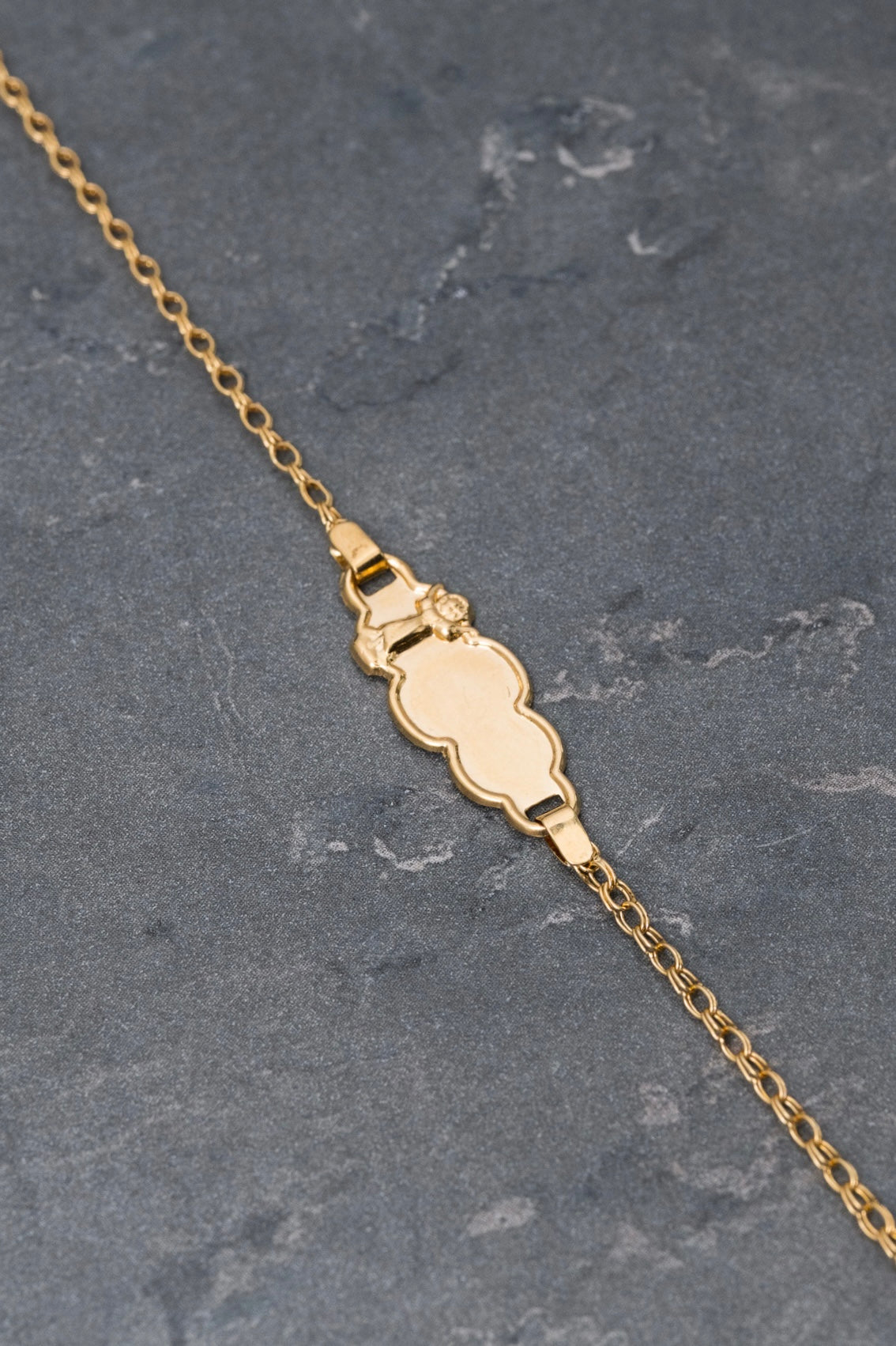 Pulso bebé con placa divino niño 1.25gr / Largo 14.5cm / Oro Amarillo Nac M