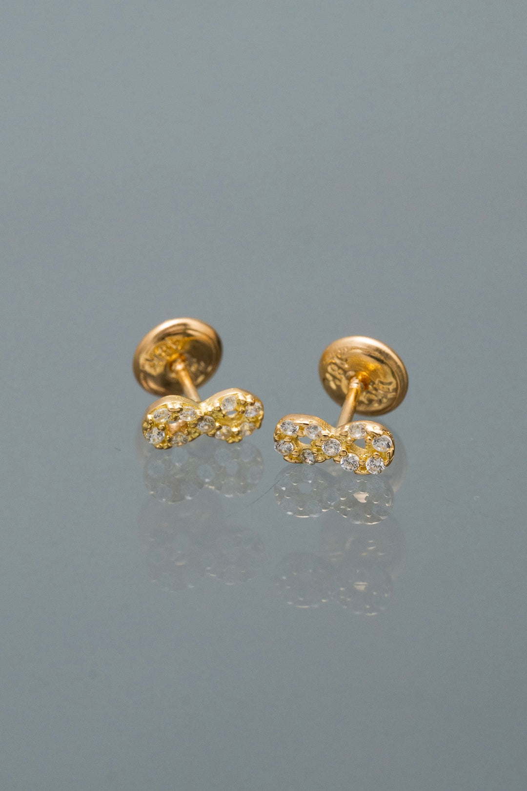 Topos infinito con swarovski blanco 0.8gr / Largo 0.3cm — Oro Amarillo