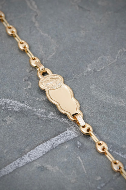 Pulso Bebe con Placa San Benito 1.8gr / 15cm / 8.5mm — Oro Amarillo