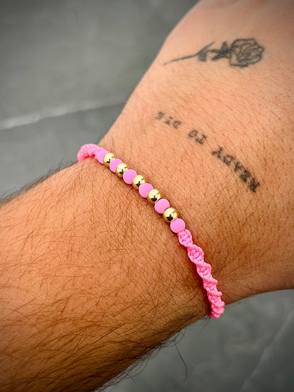 Pulsera en Hilo Rosado con bolas lisas y neoprenos 0.4gr — Oro Amarillo
