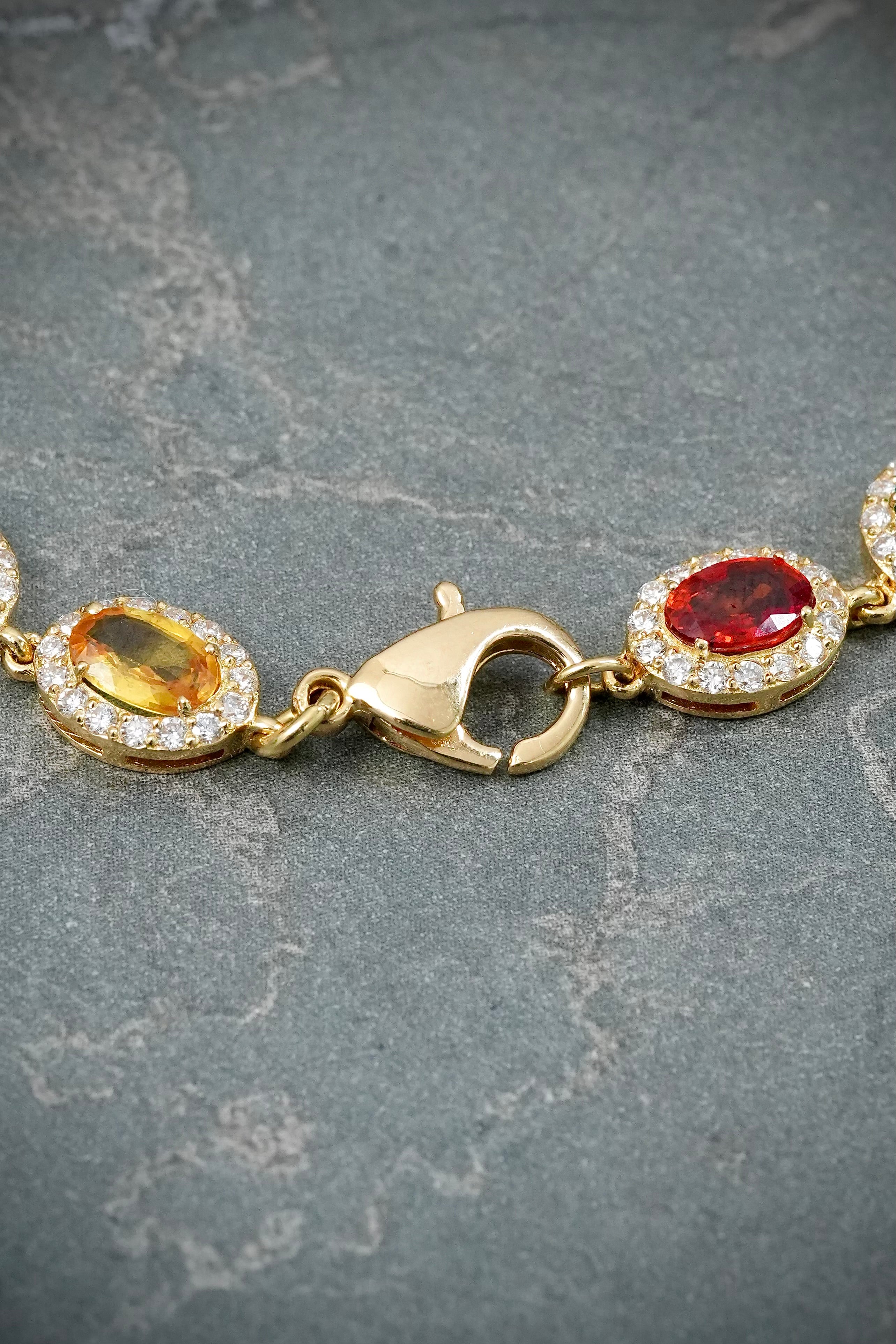 Pulso con 621pts zafiro, 288pts esmeralda y 245pts diamante LB 11.9gr / Largo 19cm / Oro Amarillo (Joya) M