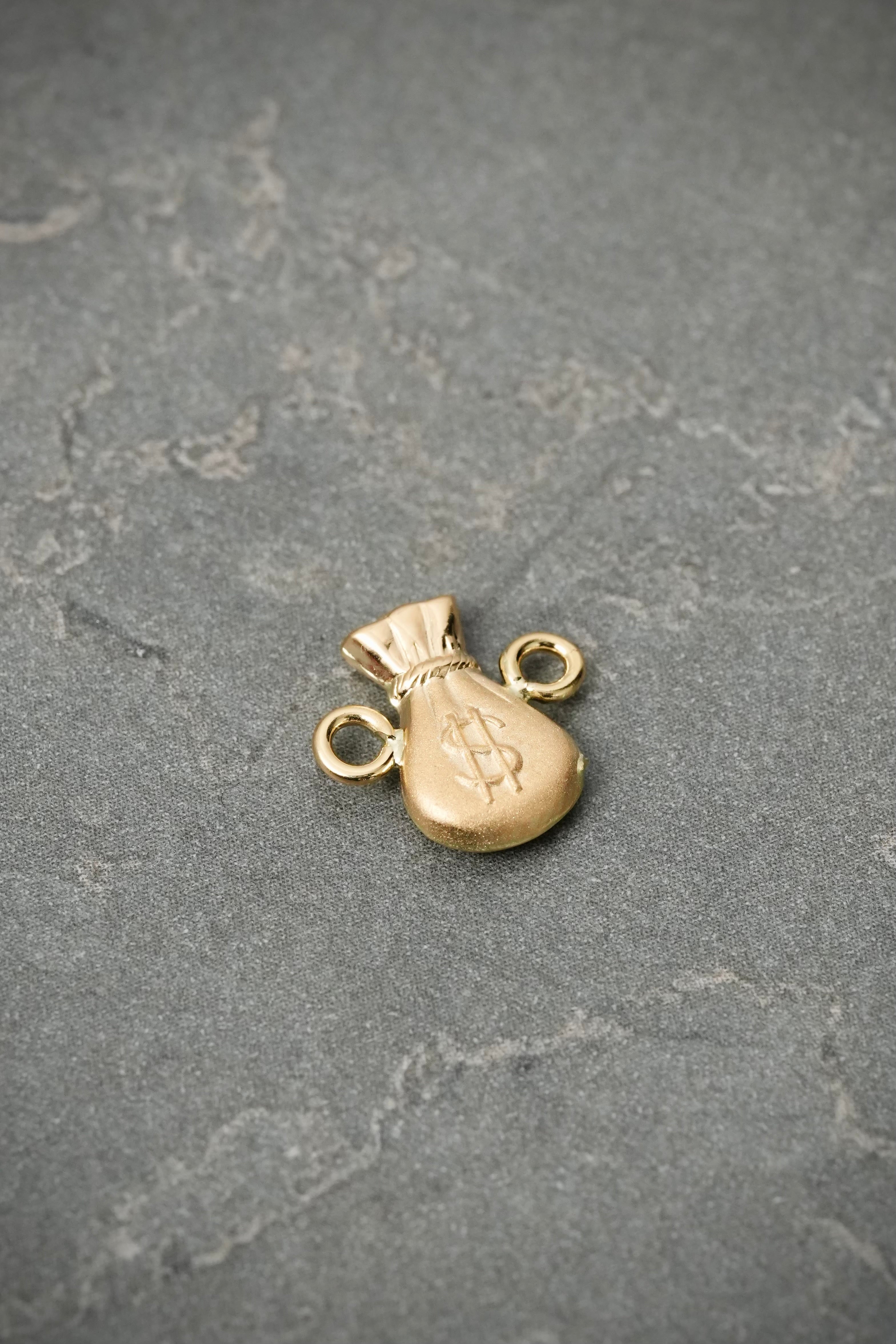 Herraje bolsa de dunero 0.4gr / Largo 1cm — Oro Amarillo
