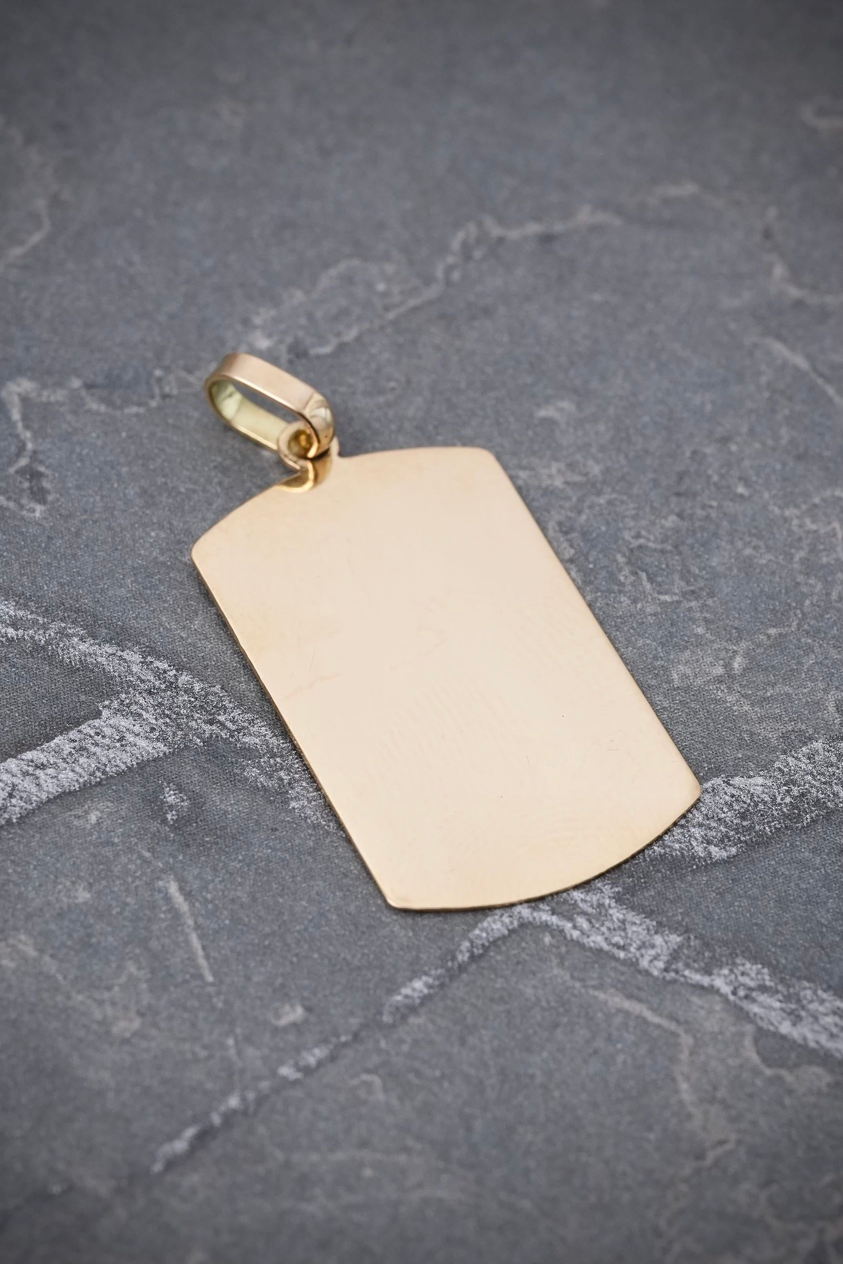 Dije placa lisa 2.6gr / Largo 3.3cm / Oro Amarillo Nac M