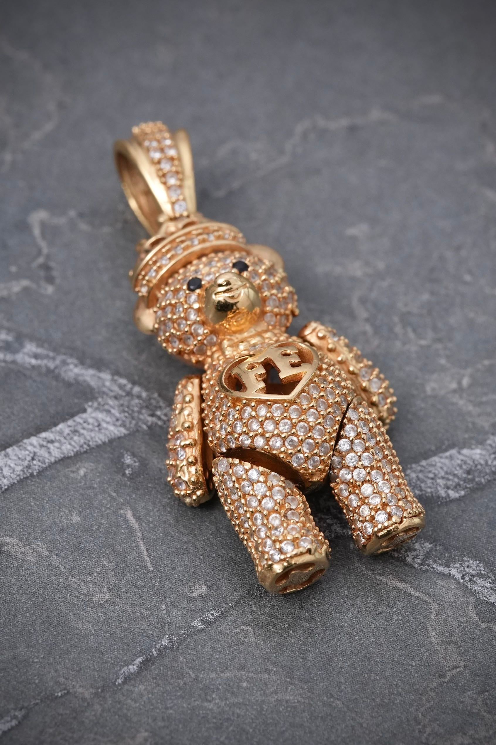 Dije oso con swarovski blanco y negro 12gr / Largo 4.2cm / Oro Amarillo Nac B