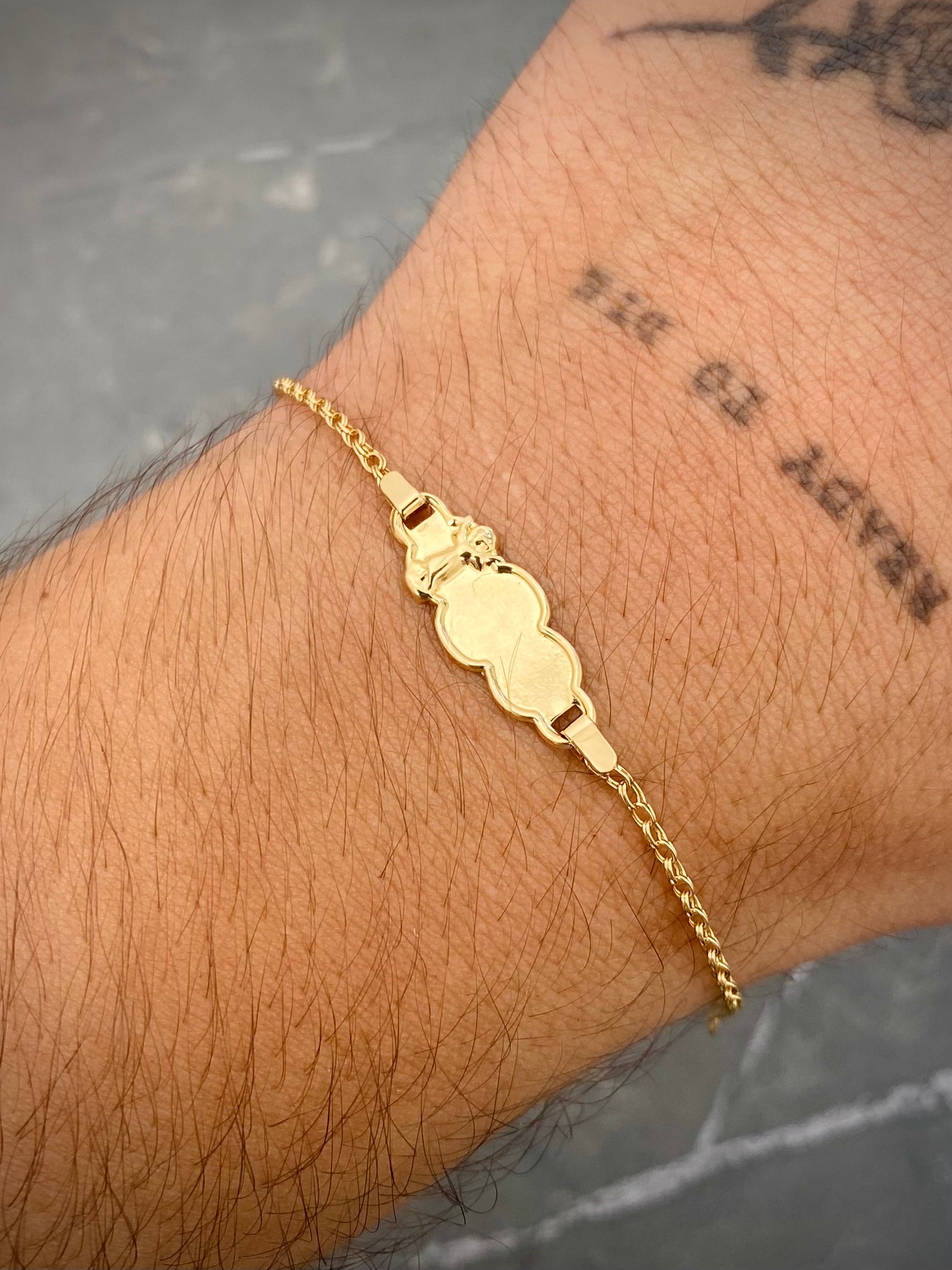 Pulso bebe con placa divino niño 1.25gr / Largo 14.5cm / Oro Amarillo Nac P