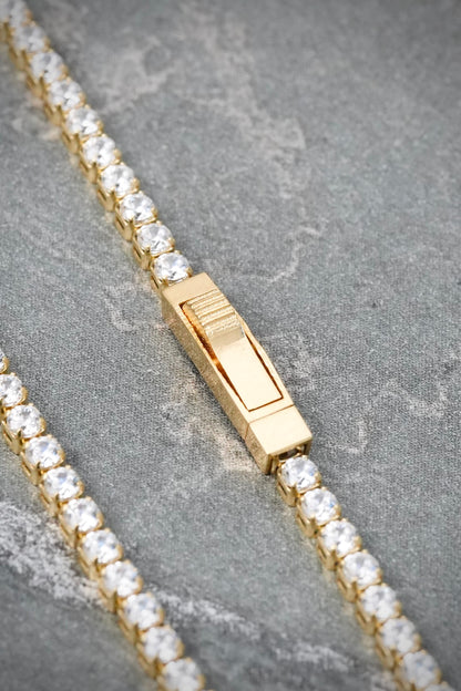 Pulso Tenis con Swarovski Blanco 2.65gr / 18cm / 1.8mm — Oro Amarillo