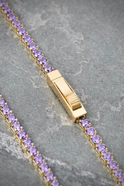 Pulso Tenis con Swarovski Morado 2.45gr / 18cm / 1.8mm — Oro Amarillo