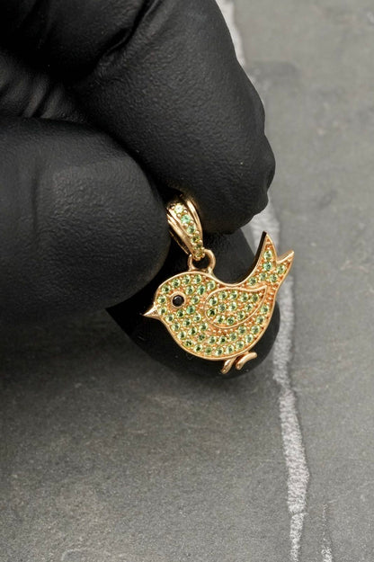 Dije pajaro con swarovski verde 1.65gr / Largo 2cm / Oro Amarillo Nac M