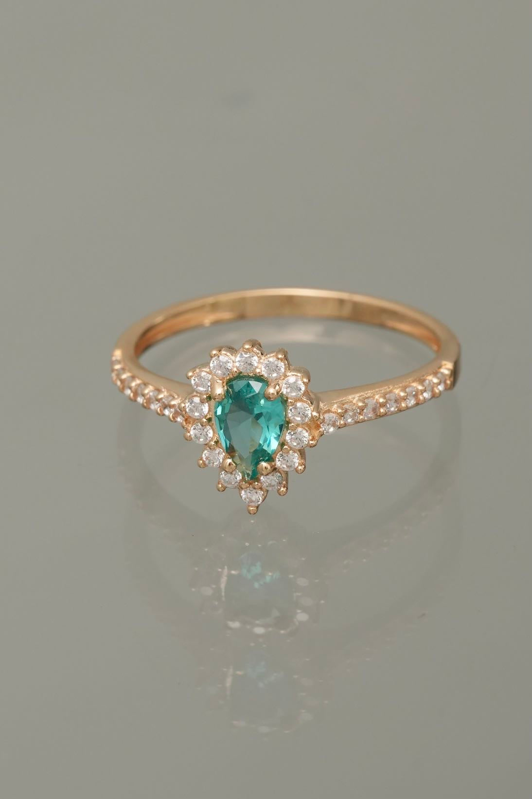 Solitario gota con Swarovski azul y blanco 2.4gr / Talla 7 1/2 / Oro Amarillo Nac M