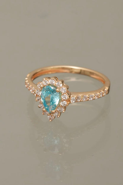 Solitario gota con swarovski blanco y azul 2.2gr / TALLA 5 / Oro Amarillo Nac B