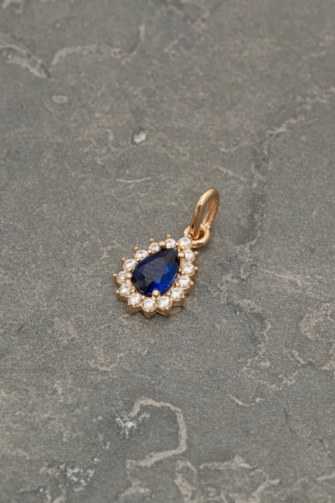 Dije lagrima con swarovski azul y blanco 0.75gr / Largo 1.5cm — Oro Amarillo