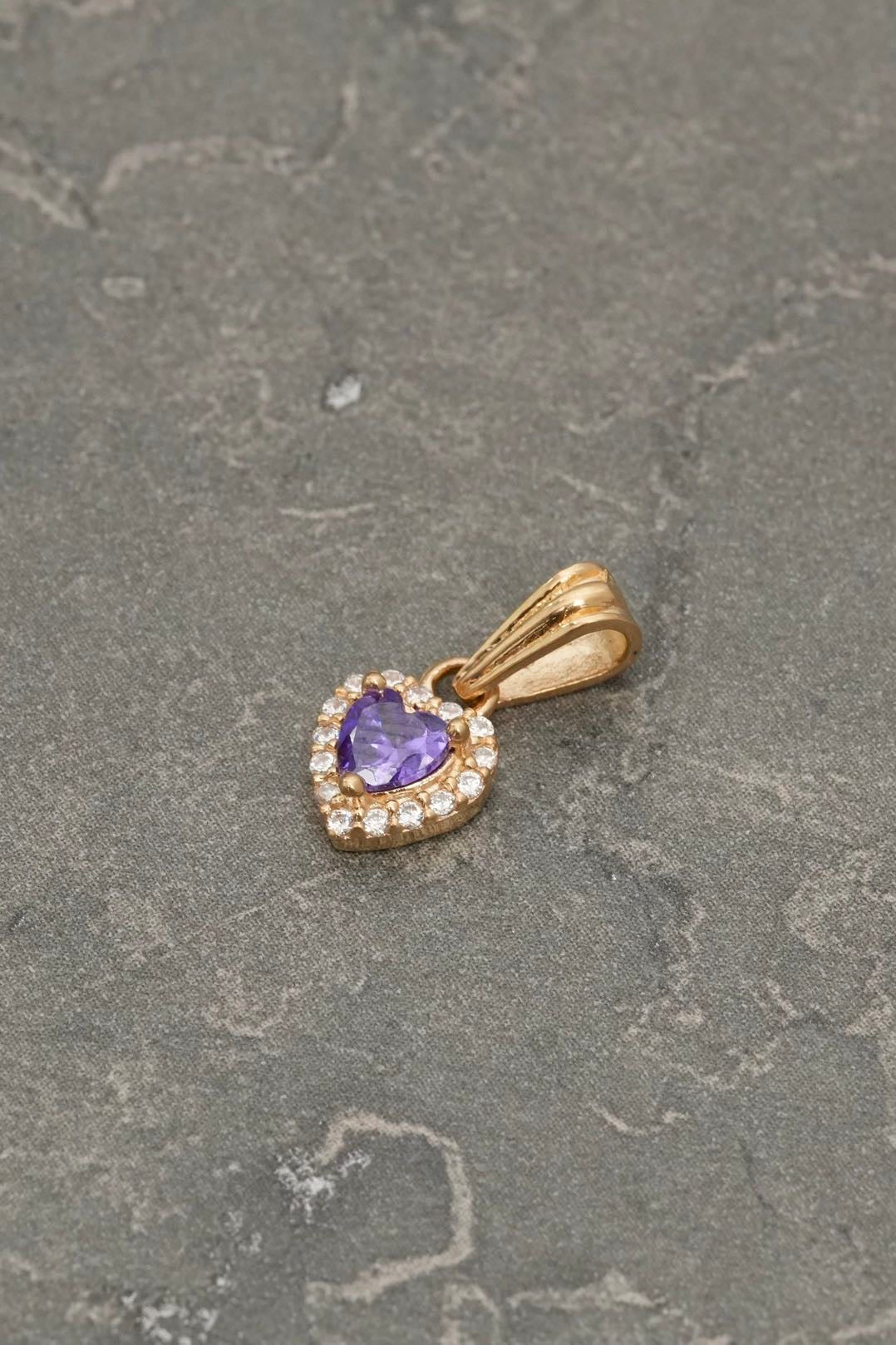 Dije corazon con swarovski morado y blanco 0.9gr / Largo 1.4cm / Oro Amarillo Nac B