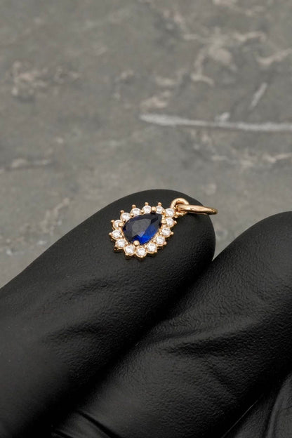 Dije lagrima con swarovski azul y blanco 0.75gr / Largo 1.5cm — Oro Amarillo