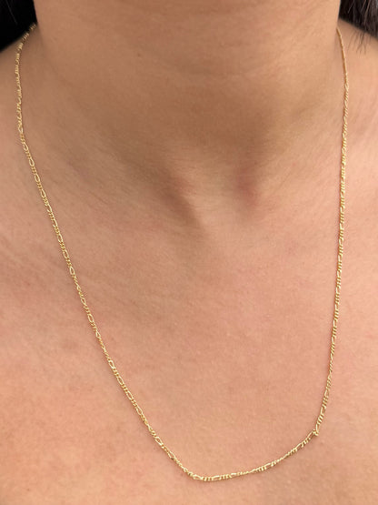 Cadena Figaro 1.6gr / 55cm / 1.5mm — Oro Amarillo