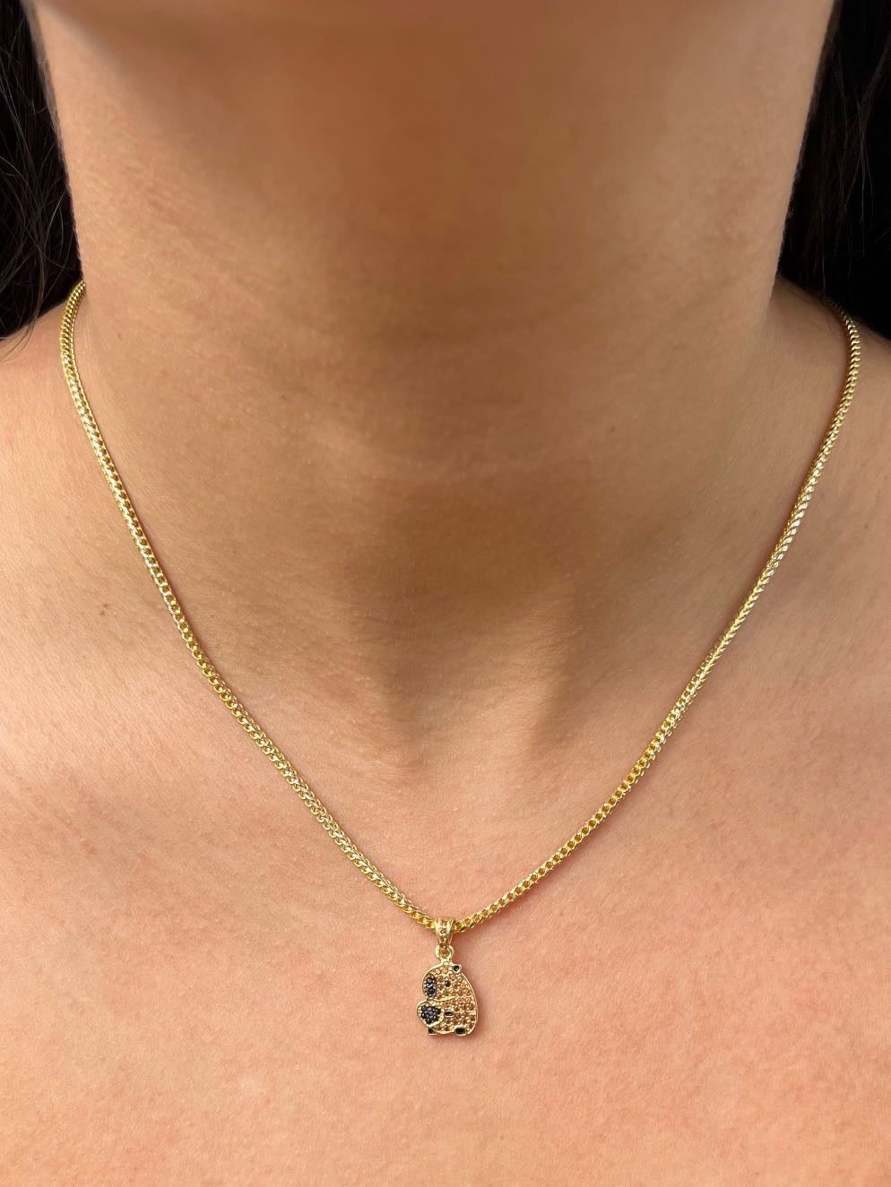 Dije de capibara con swarovski cafe y negro 1.5gr / Largo 2.0cm — Oro Amarillo