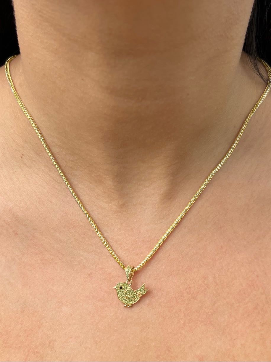 Dije pajaro con swarovski verde 1.65gr / Largo 2cm — Oro Amarillo