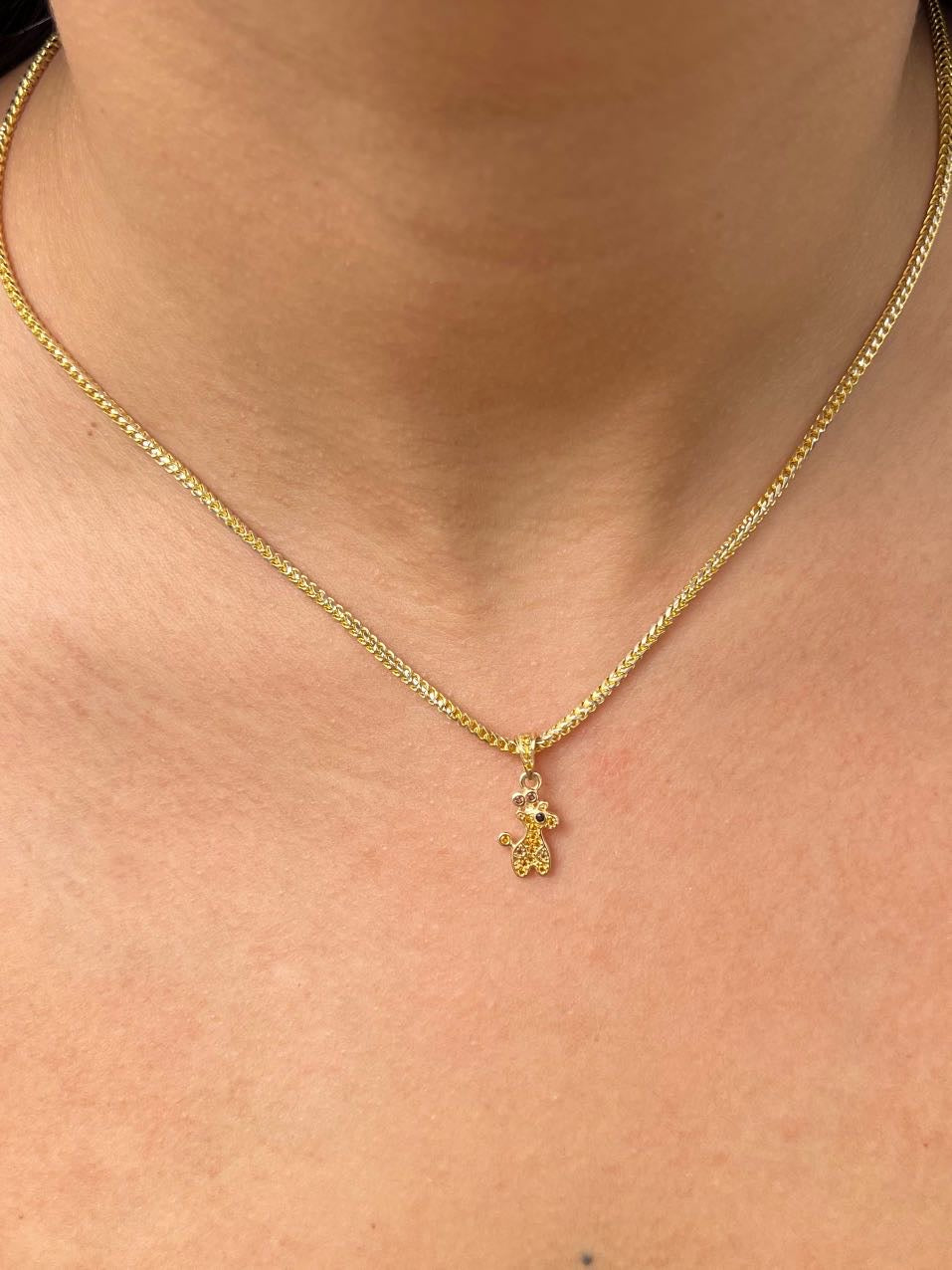 Dije jirafa con swarovski naranjado 1gr / Largo 1.8cm — Oro Amarillo