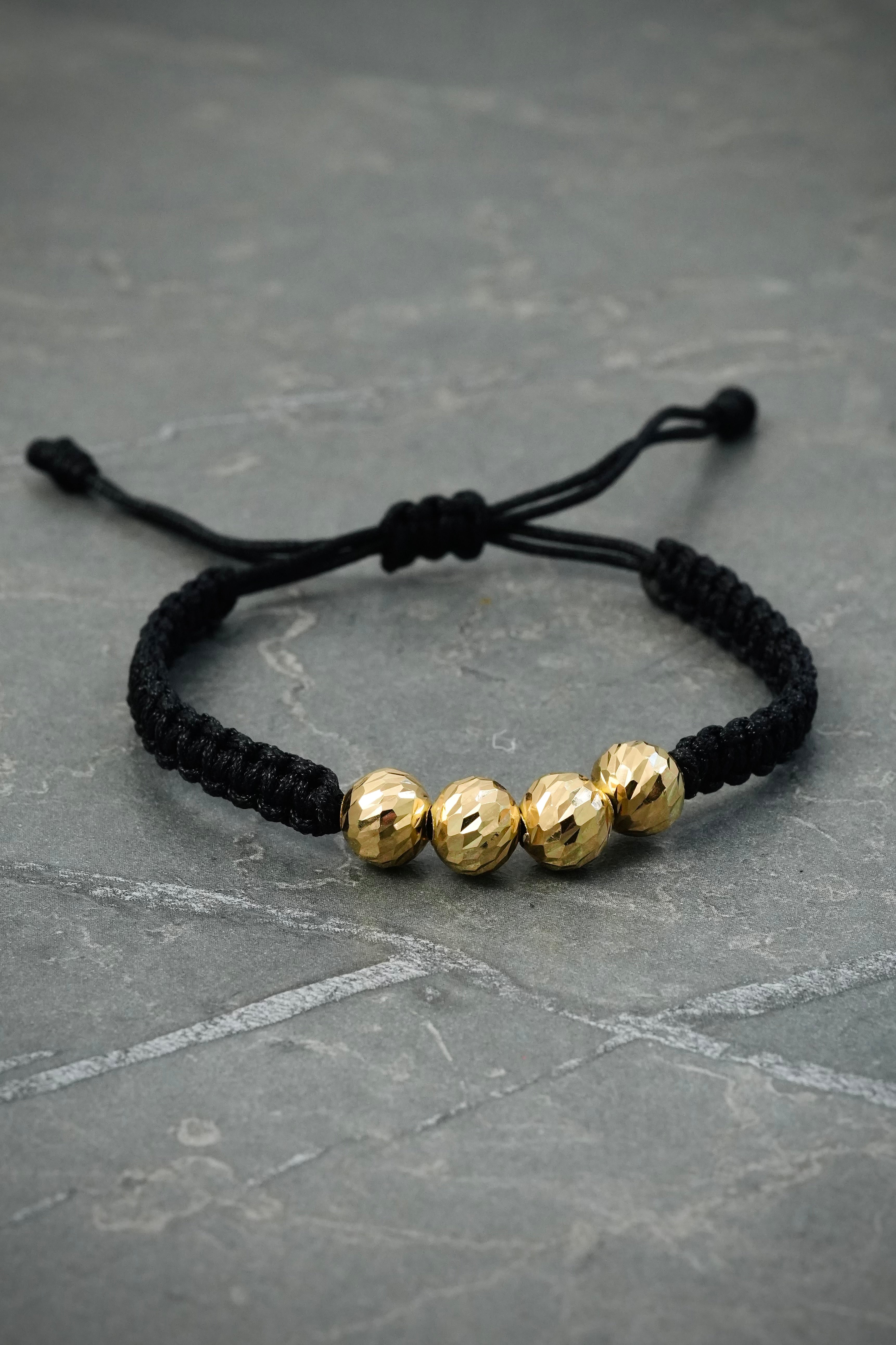 Pulsera Hilo Negro con Bolas Diamantadas 1.2gr — Oro Amarillo 18K